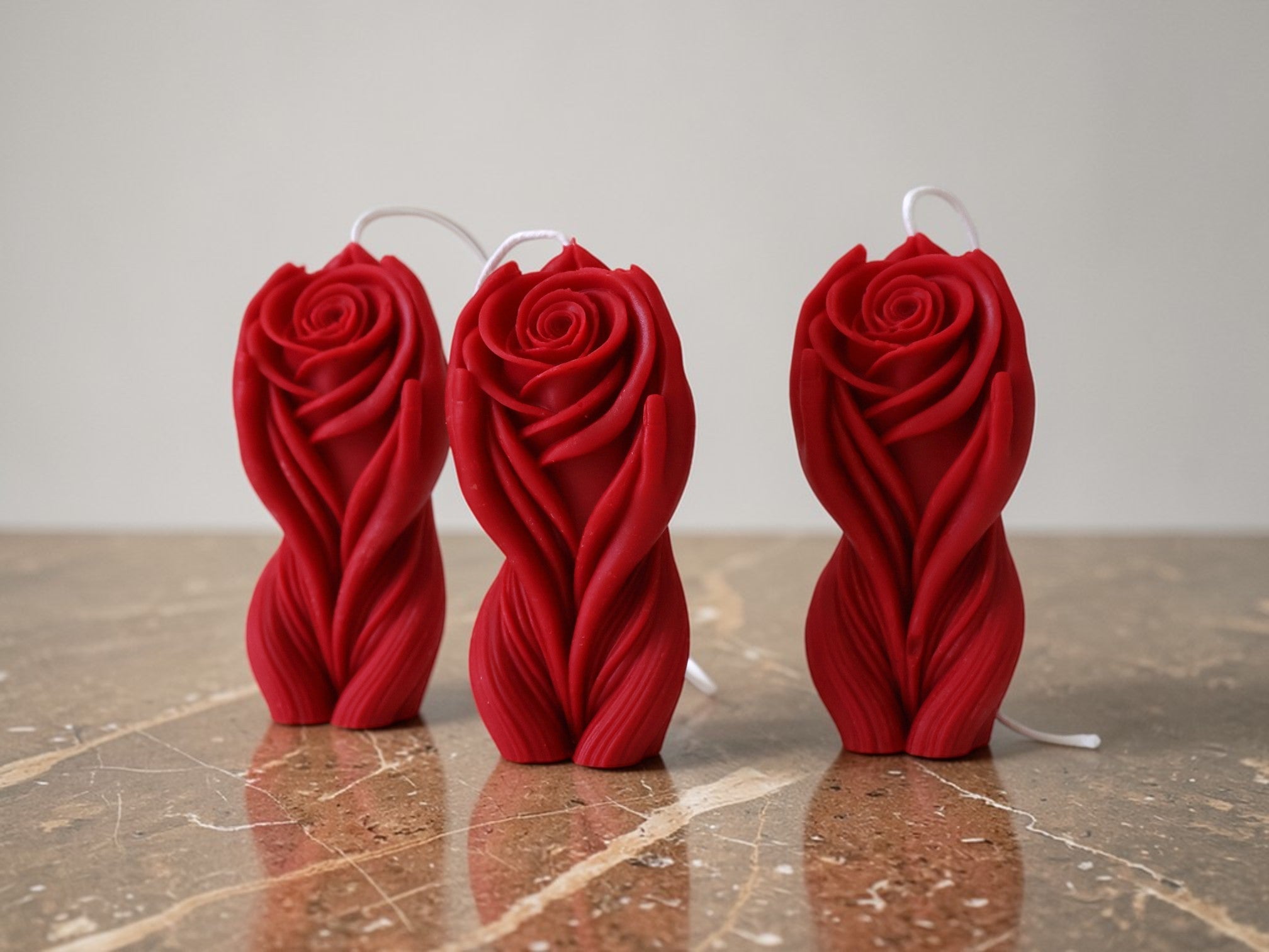 Hands Holding Rose Candle