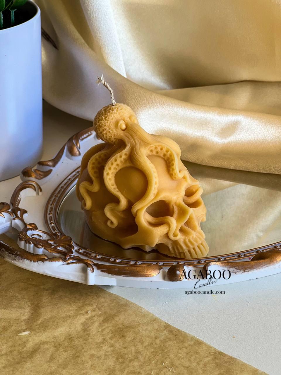 Skull with octopus candle