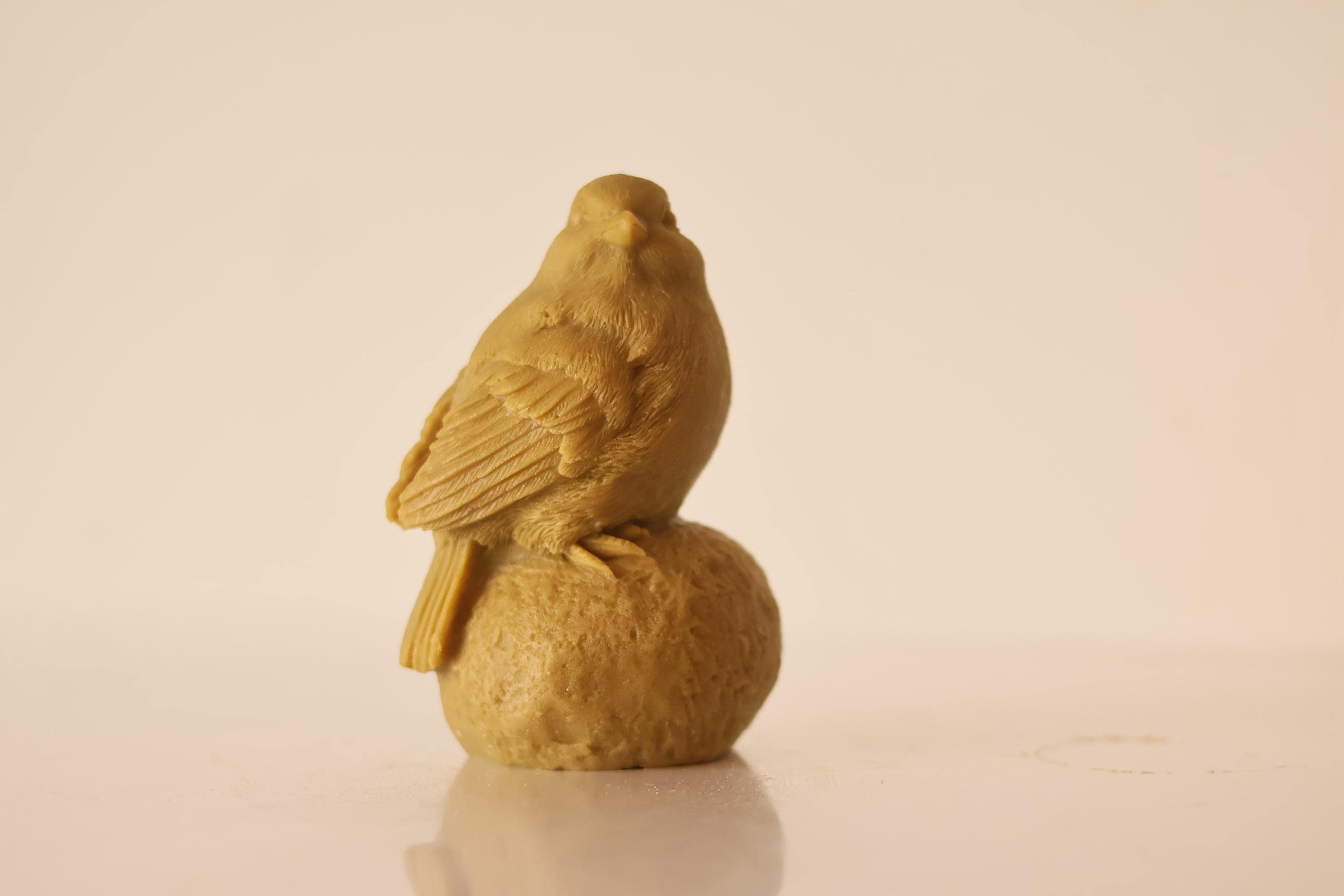 Sitting on Stone Bird Candle