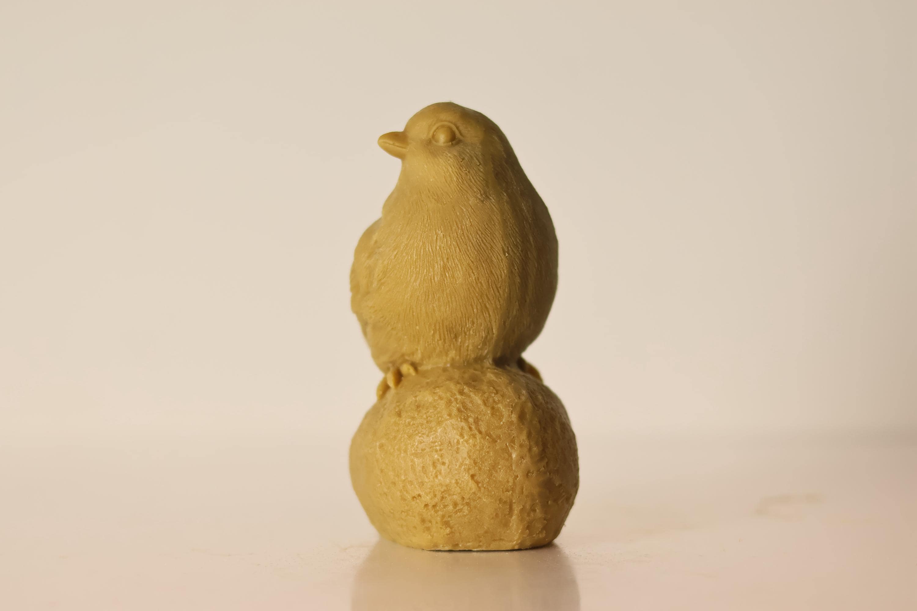 Sitting on Stone Bird Candle
