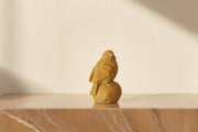 Sitting on Stone Bird Candle